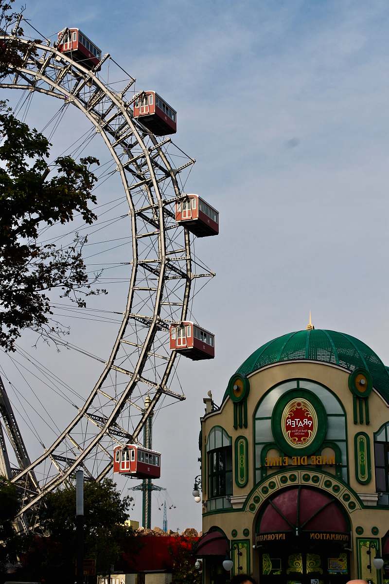 ferris wheel green and brown concrete building prater